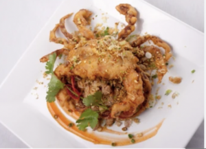 Soft shell crab, fried on a plate.
